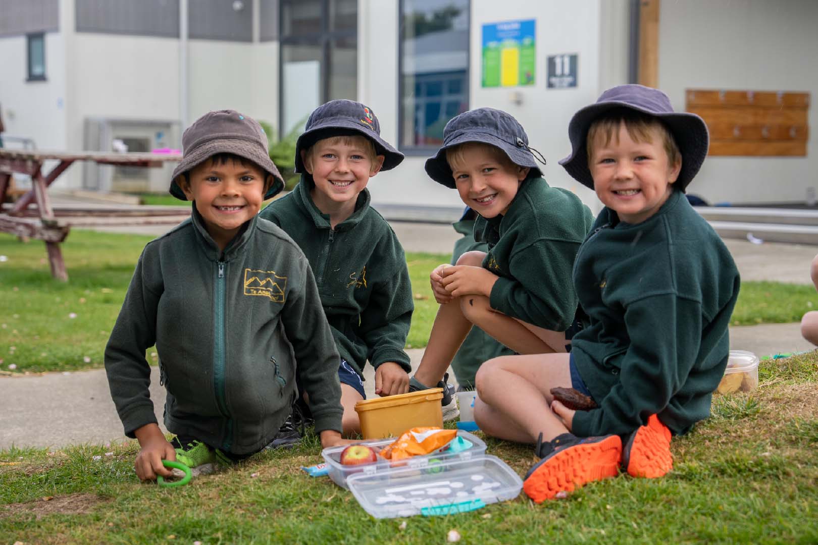 Four Te Anau School children smiling